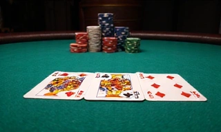 Poker table with cards and chips